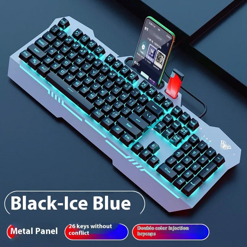 Black mechanical keyboard with colourful backlighting, mouse, and headset on metal frame