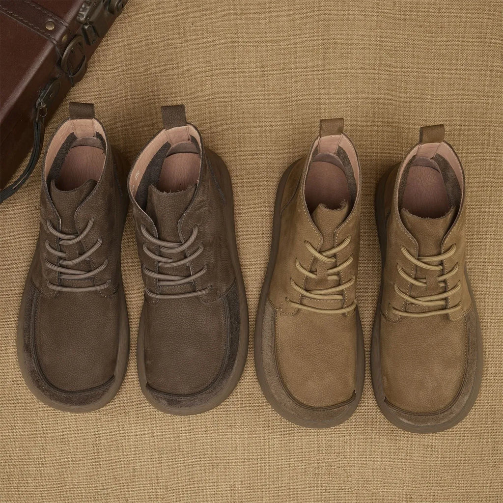 Men's grey frosted leather Martin boots with wedge heel and lace-up front.