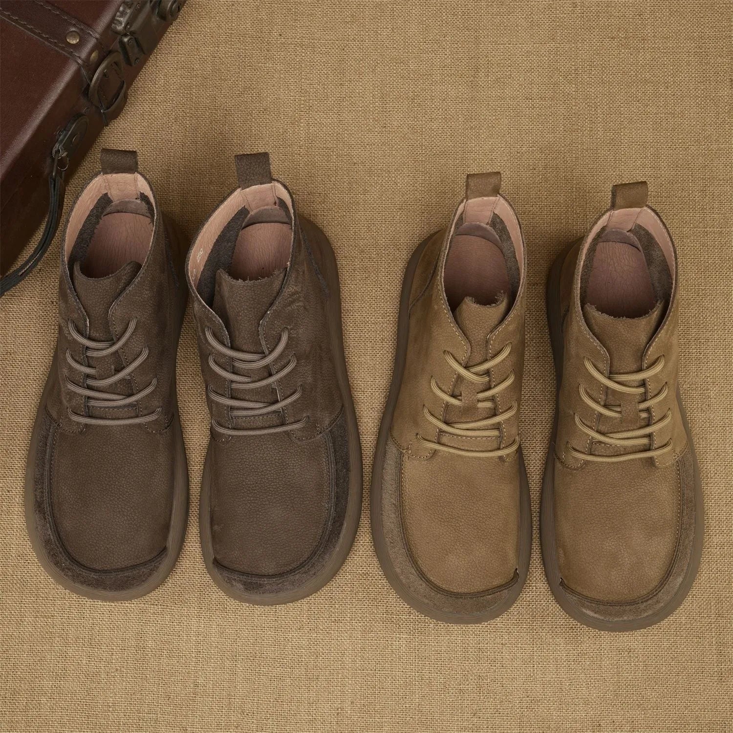 Men's grey frosted leather Martin boots with wedge heel and lace-up front.