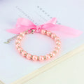 Diamond dog pearls necklace with adjustable clasp, imitation pearls, and rhinestones on soft ribbon for small pets