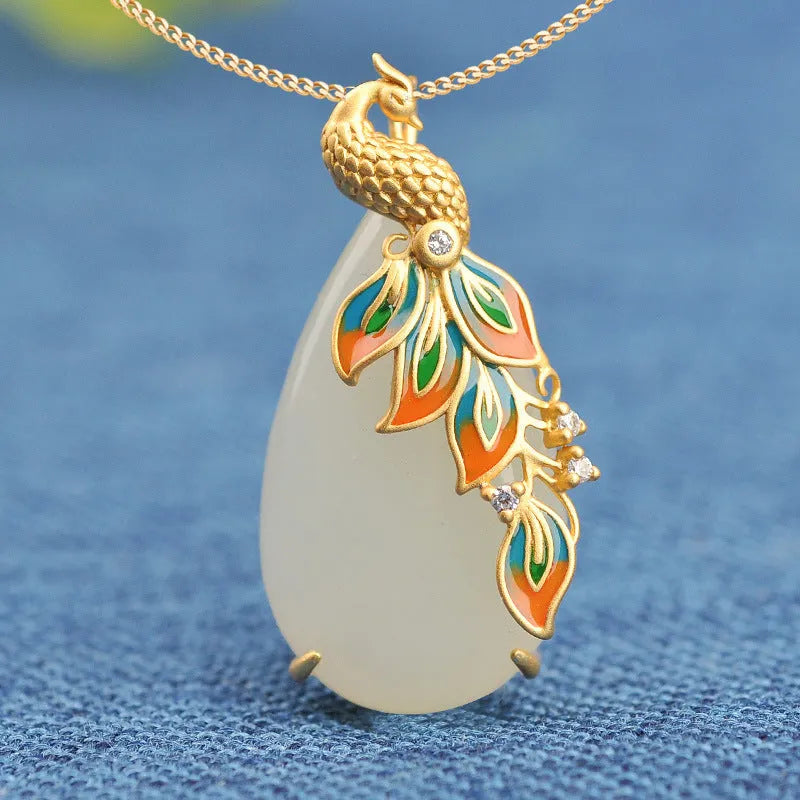 Phoenix pendant necklace with white jade effect and electroplated copper, shown with optional 40cm gold necklace