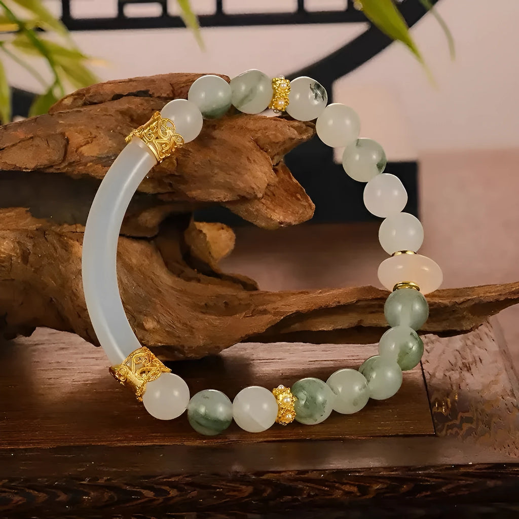 Emerald green Tian Shan jadeite half bracelet with floating flower girl design and round elements