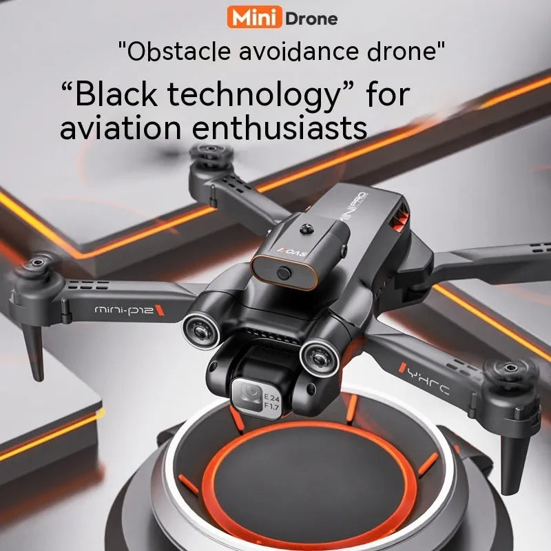 Black and orange quadcopter with HD camera, folded to 4.5 cm size, showing remote control and spare blades