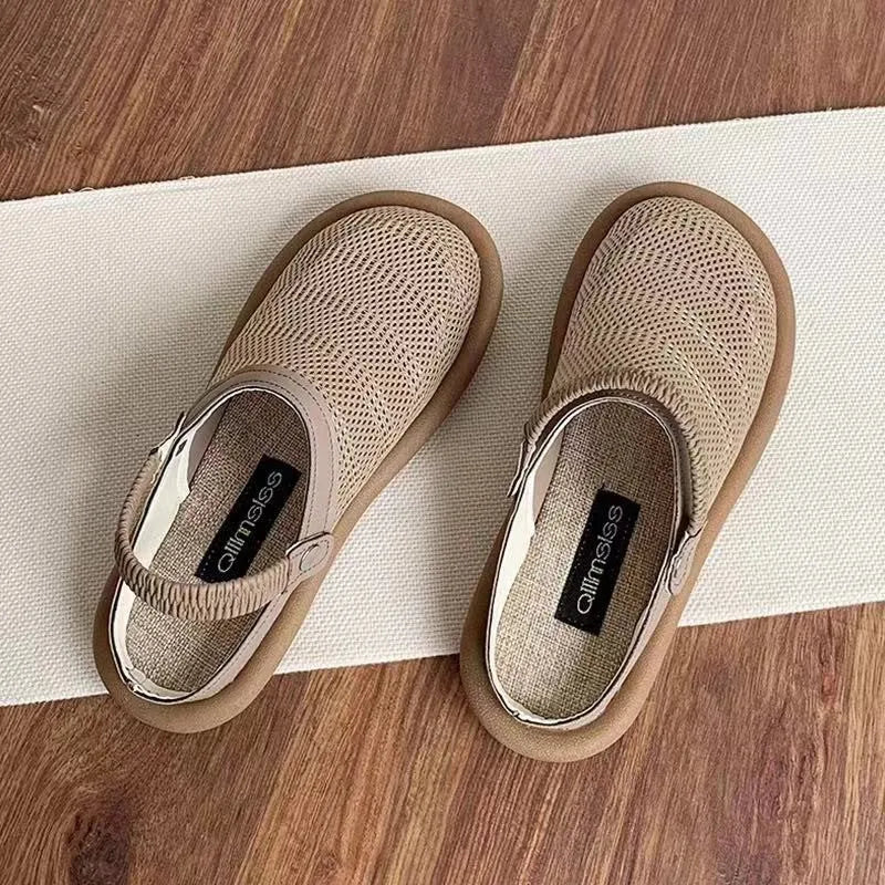 Milky white linen slip-on shoes with mesh lining, round toe, and a light rubber sole on a neutral background.