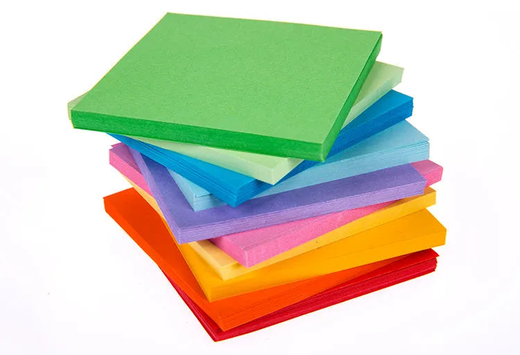 Assorted colourful mini paper scrolls with eyelets for drift bottle messages in sizes 3x7cm, 4x7cm, 7x7cm, and 5x5cm.