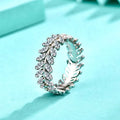 Silver closed ring for women with inlaid zircon stone, leaf shape and wheat detail in white gold colour, sizes 6 to 9