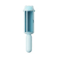 Blue pet hair remover with self-cleaning base rolling on a sofa to collect dog fur