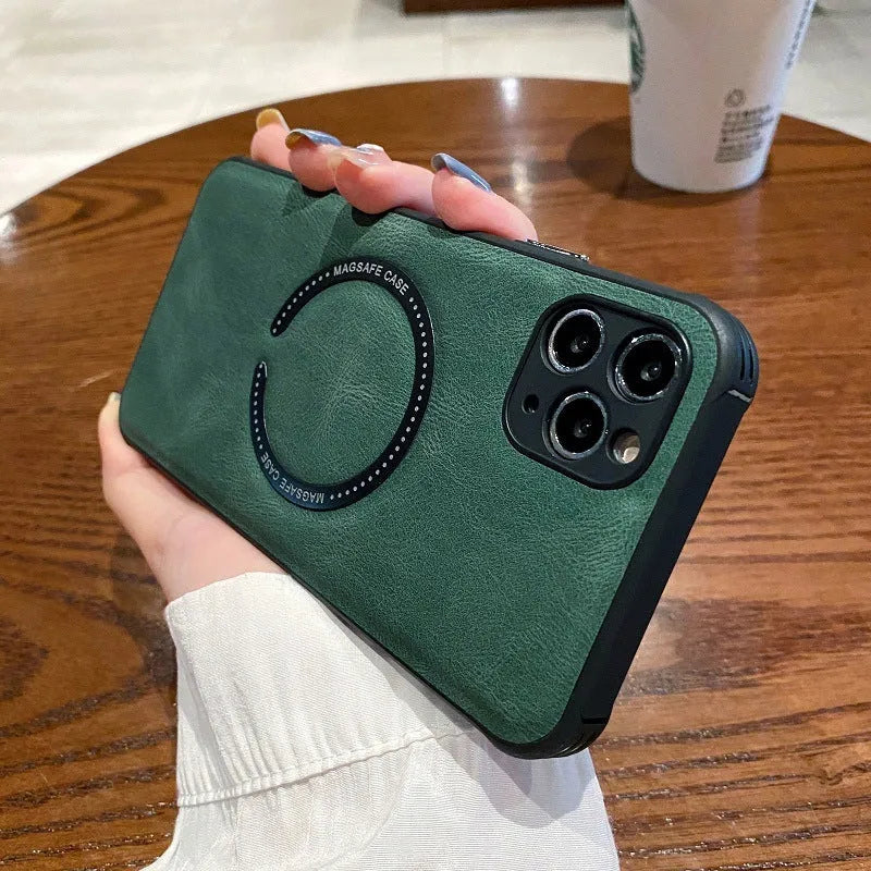 Black imitation leather magnetic charging case for iPhone on a magnetic charging puck