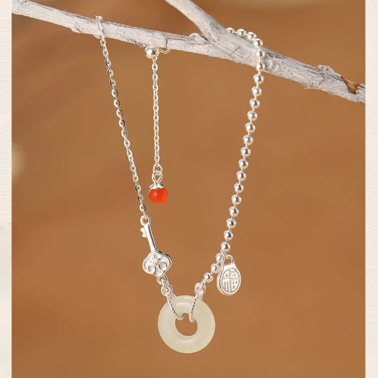 Women's 925 silver bracelet with Hetian jade elements in Chinese style geometry design