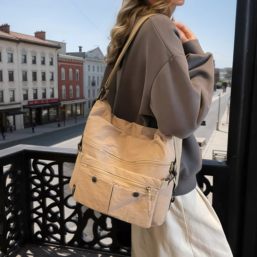 Women's soft nylon crossbody bag with sandwich zipper pocket and adjustable shoulder straps