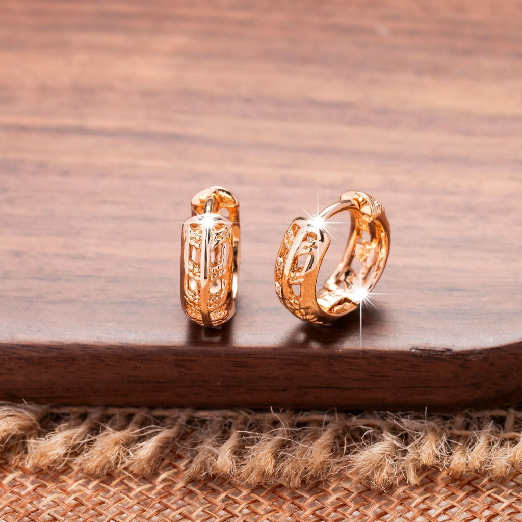 Rose gold leaf-shaped hollowed-out earrings with heart detail, copper construction, 3cm drop length
