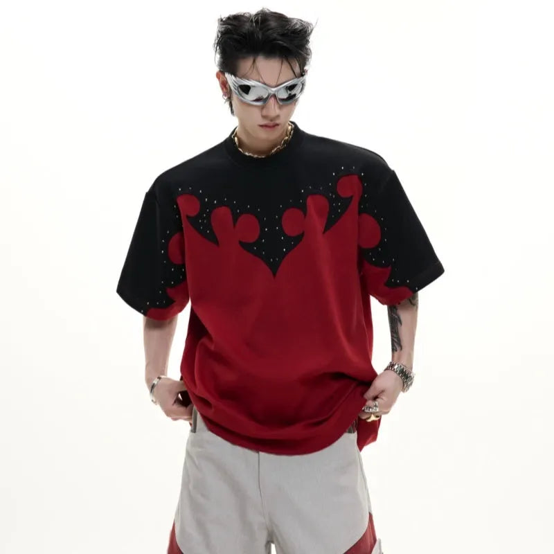 Men's cotton short-sleeved shirt with burnt flower detailing and stitching on a grey background