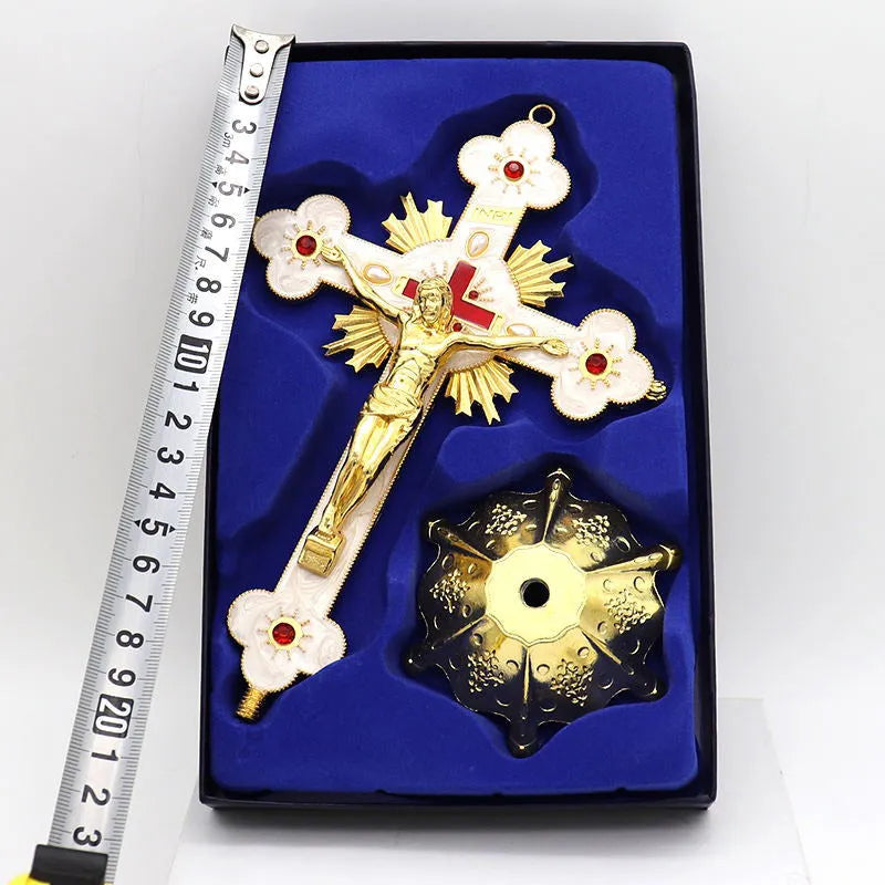 Close-up of a geometric zinc alloy desktop ornament with micro-inlaid detail in a gold and blue finish.