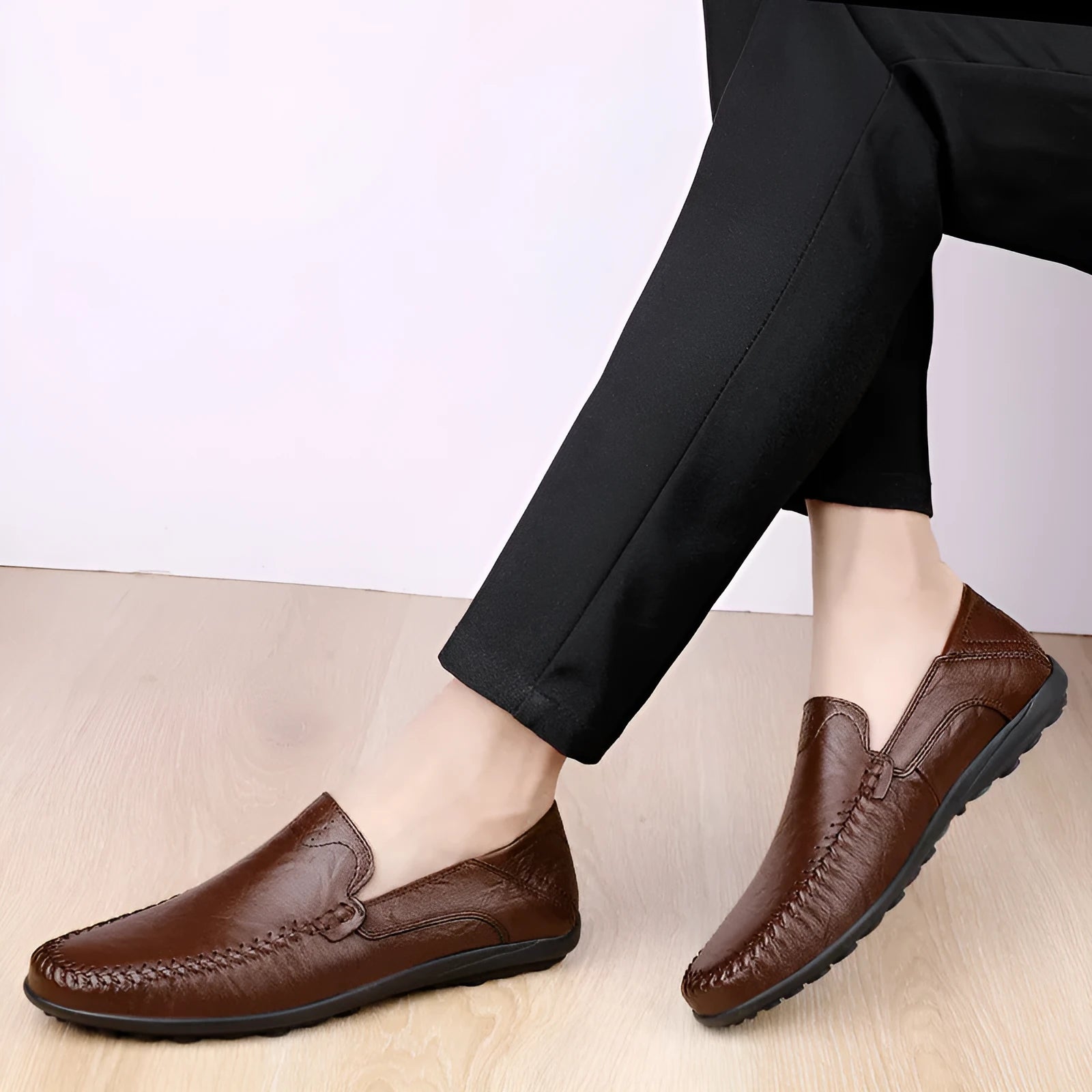 Men's brown leather casual shoes with round toe and flat heel design on rubber sole