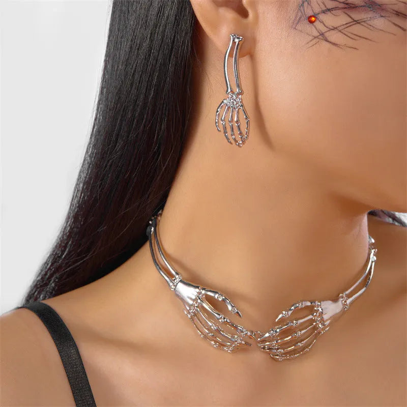 Dark style skull and ghost hand jewellery set with matching necklace and earrings in electroplated alloy