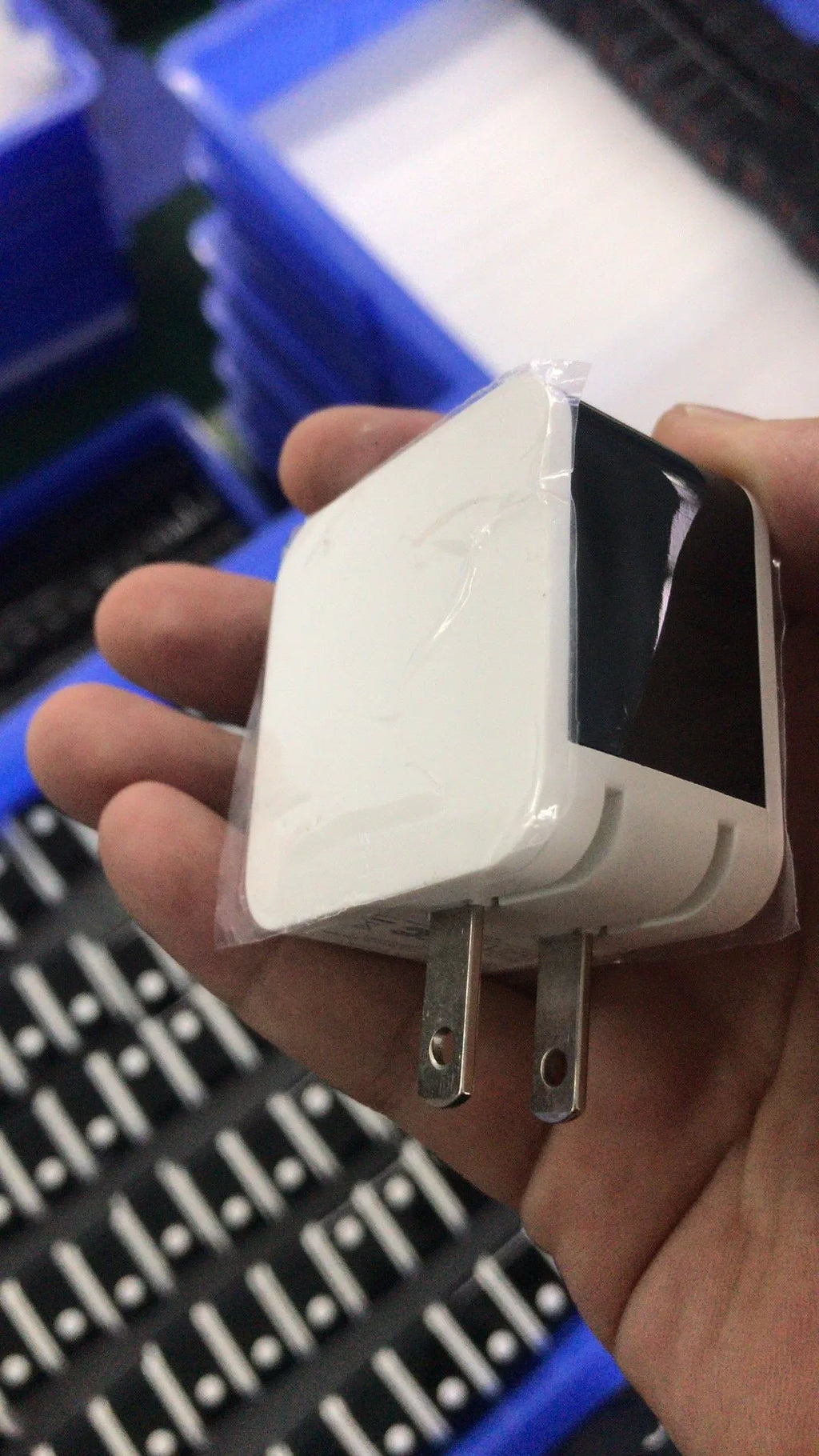 5V2.4A dual USB travel charger with digital display showing charging parameters, compact black design with regional plug