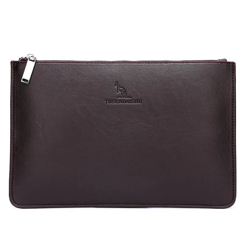 Men's black PU leather clutch with six card slots, measuring 18cm by 28cm, on a table