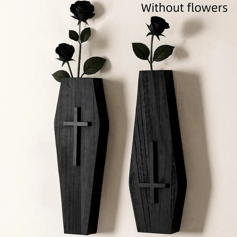 Black cross-shaped wooden wall shelf measuring 27 by 9 centimetres