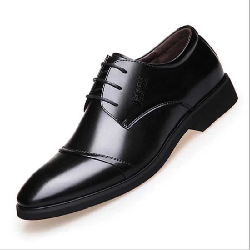Men's black leather lace-up shoe with decorative stitching and a horse buckle on a rubber sole.