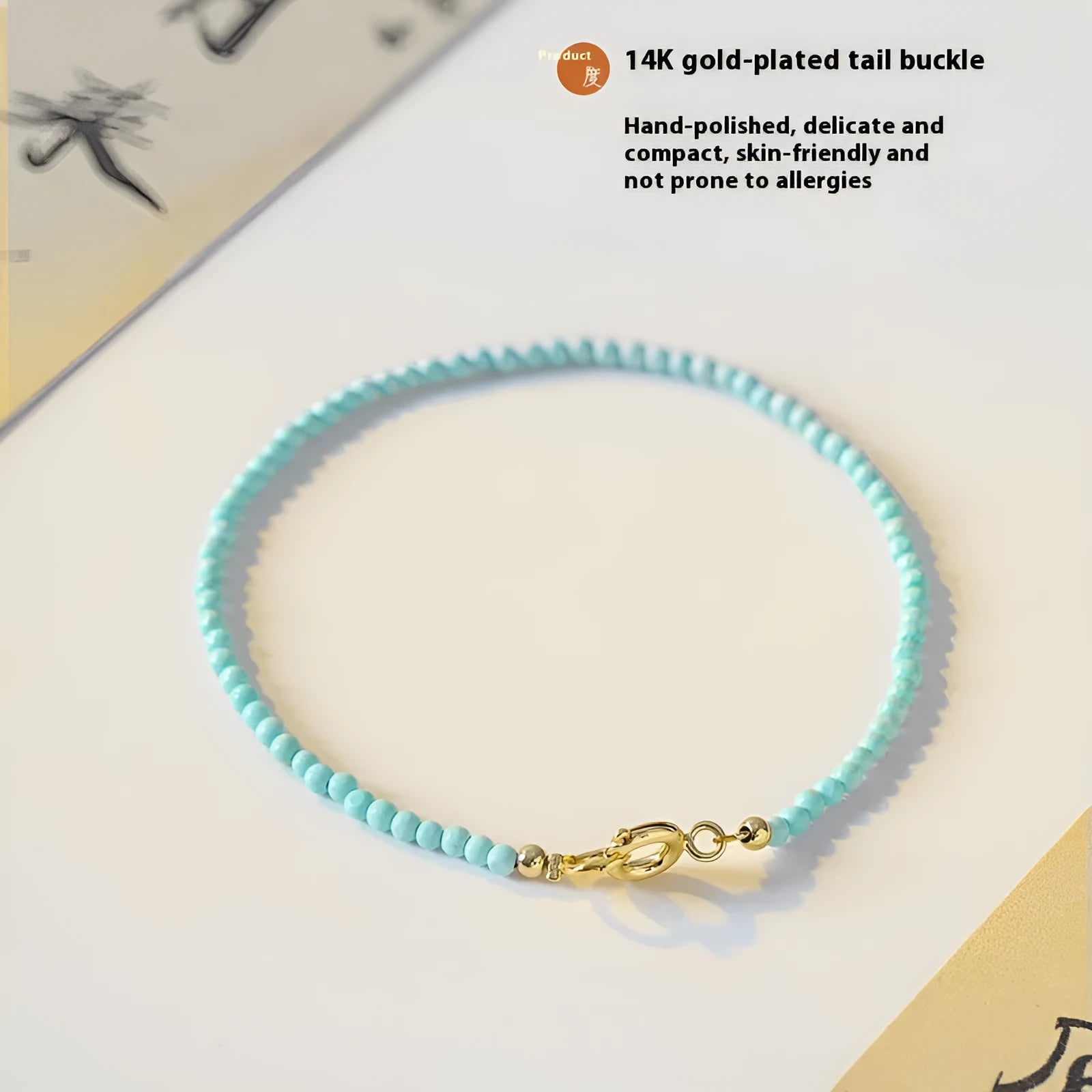 Natural 2mm raw ore turquoise bracelet on wrist, showing geometric beads and adjustable extension chain.