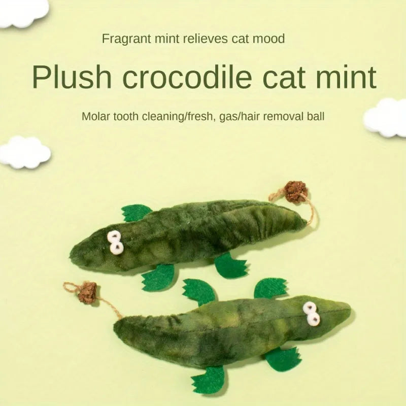 Green plush alligator catnip toy measuring 25cm long with detailed stitching and plant-based materials