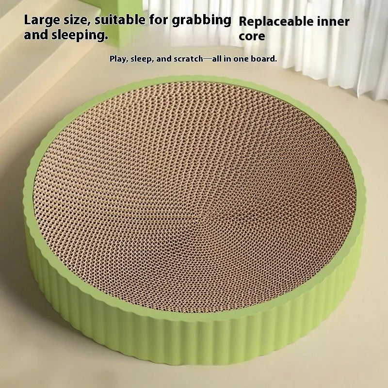 Round green cat scratching board with corrugated paper surface and two replacement refills