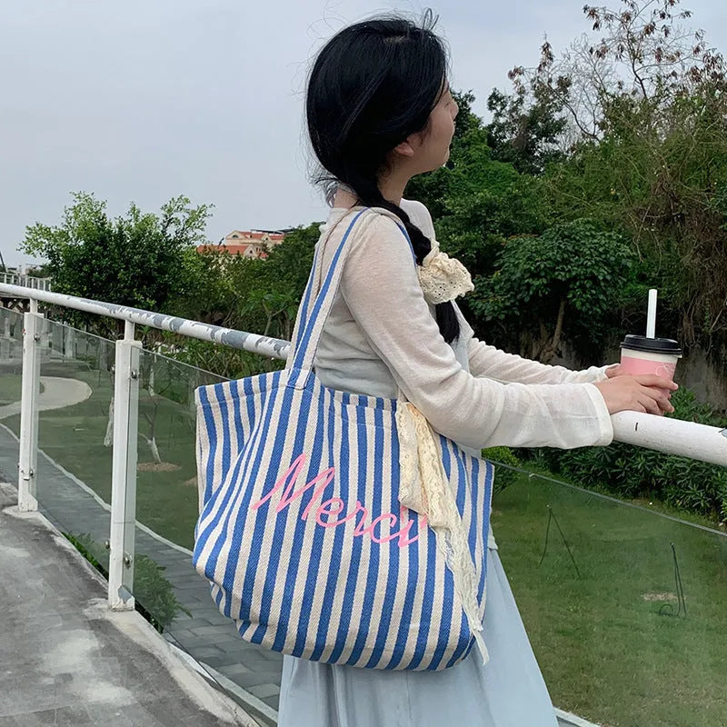 Blue striped letters printed cotton canvas bag with pink, blue and white striped design