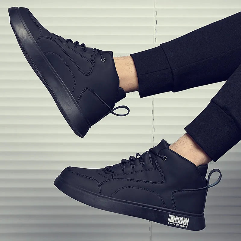 Men's white mid-top sports board shoes with low heel, round toe, and rubber sole on a casual background
