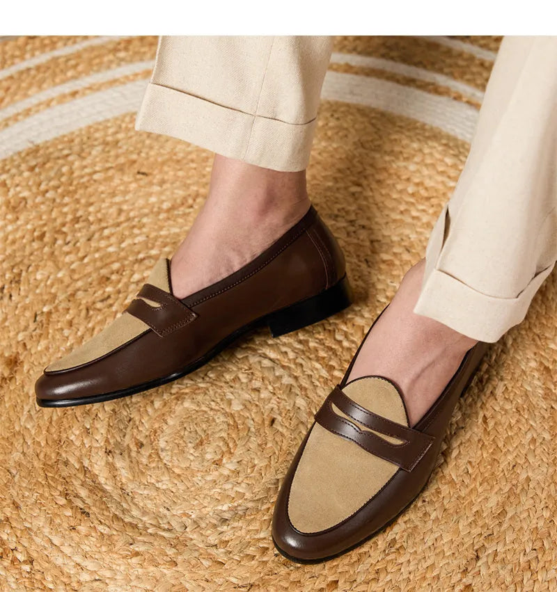 Men's champagne-coloured suede leather loafers with a slip-on design and rubber sole.