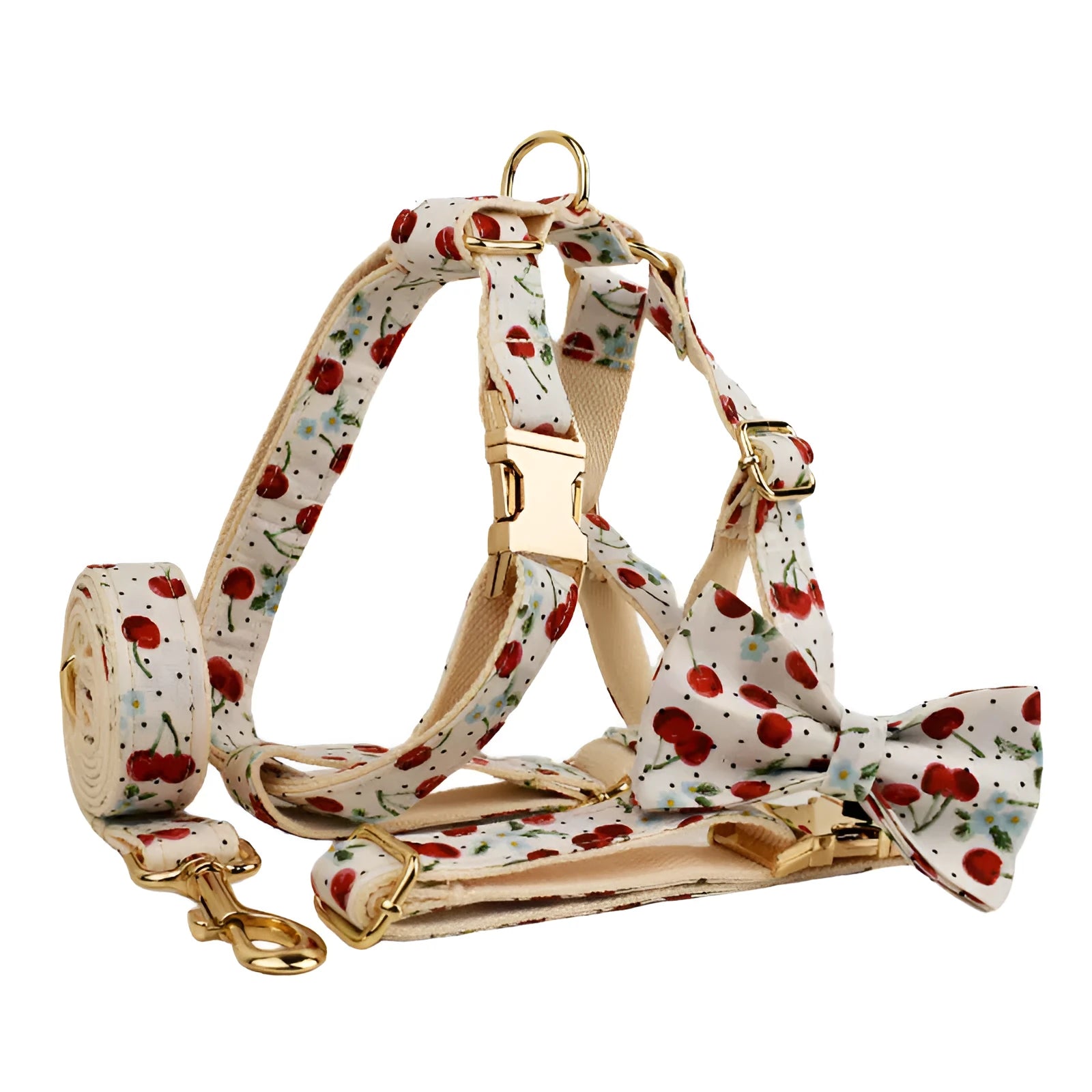 Red cherry printed cloth dog collar and leash set with matching vest, light gold buckle, and decorative bow strap.