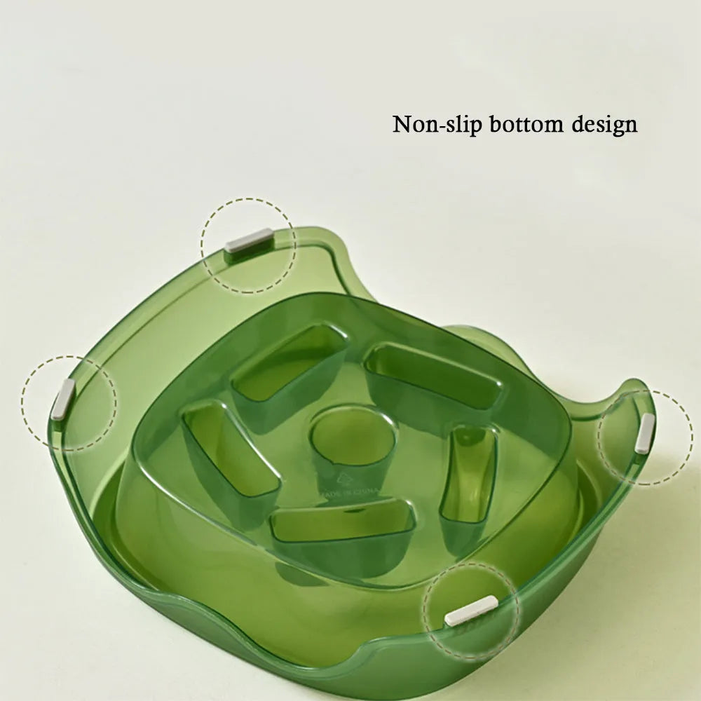 A blue plastic dog slow feeder bowl designed to prevent choking, shown alongside grey, green, and orange colour options.