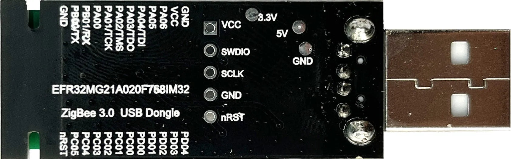 Silicon Labs EFR32MG21 Zigbee USB dongle with plastic shell, PCB antenna, and USB connector for smart home integration