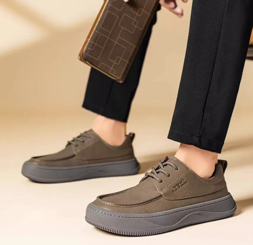 Brown retro leather casual shoes with big toe design and visible stitching on a rubber sole.