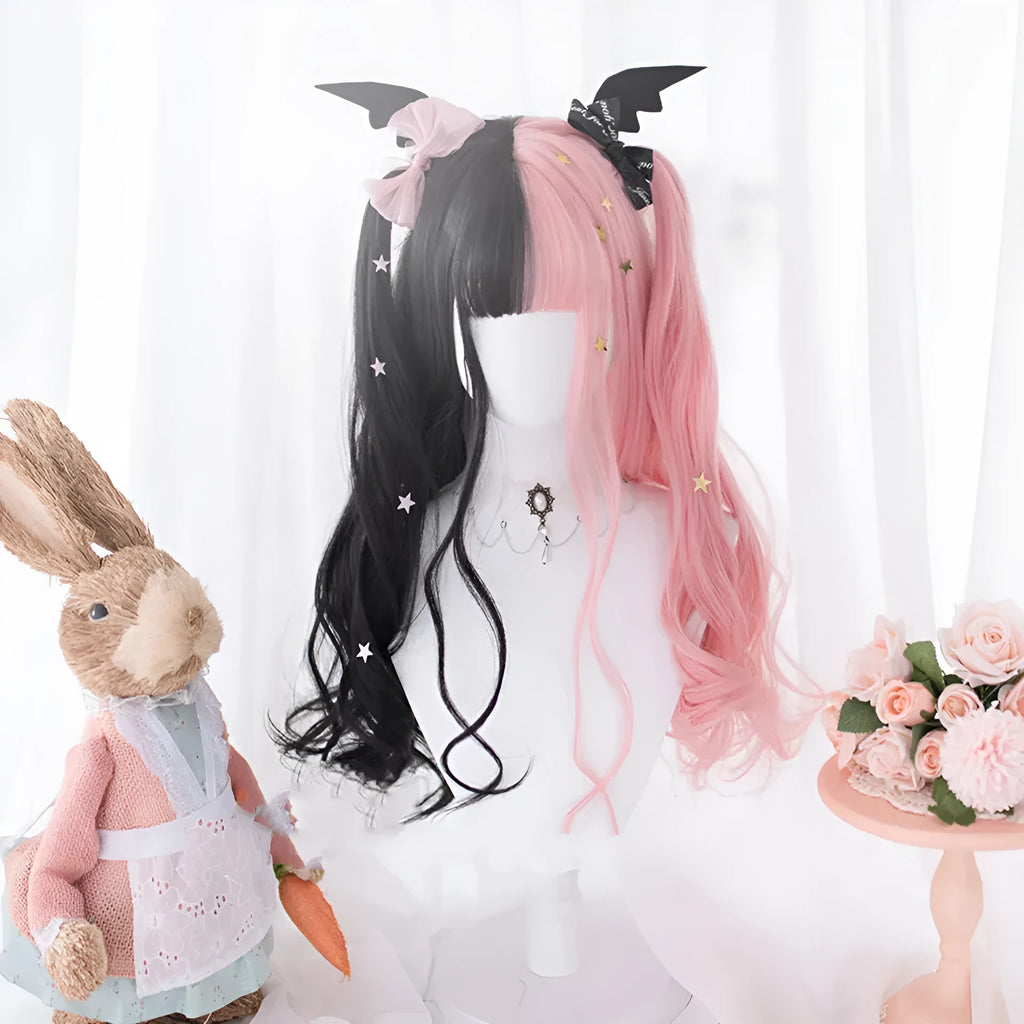 Harajuku Japanese Lolita long curly wig in black and pink colours with bangs on a wig stand.