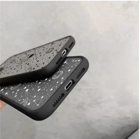 Black and white iPhone cases with blue light filtering technology for eye care.