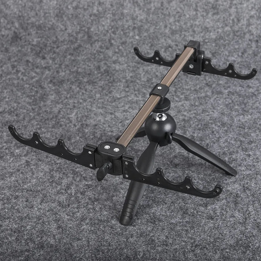 Aluminium ice fishing rod holder bracket with tripod base supporting small fishing rod