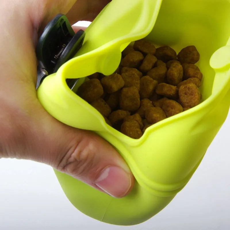 Silicone dog treat bag with magnetic closure measuring 12.5cm long, shown attached to belt with treats visible inside