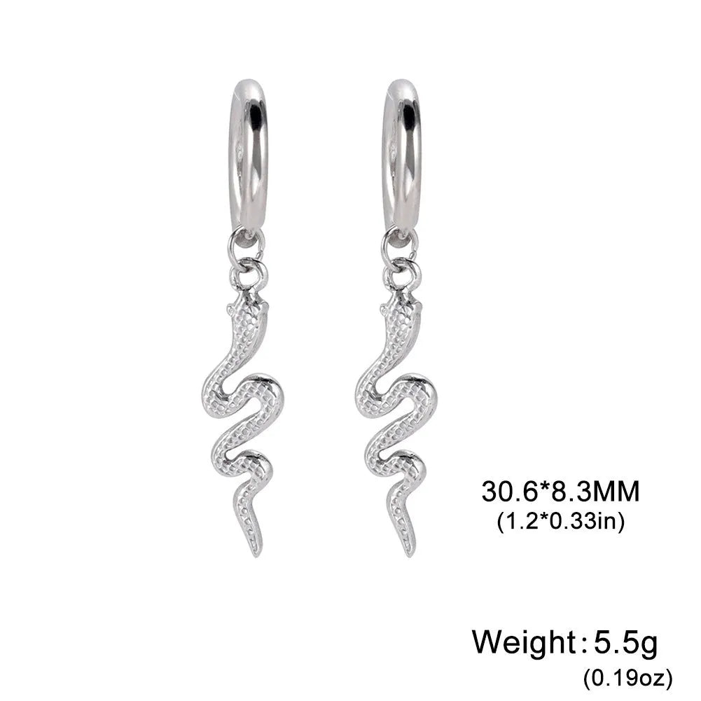 Gold plated stainless steel snake-shaped vintage earrings with detailed scale patterning and clip back closure