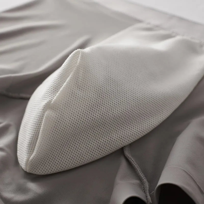 Men's solid colour boxers in breathable nylon fabric with a mulberry silk crotch lining.
