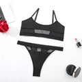 Women's black full cup bra and panty set with adjustable straps on a white background.