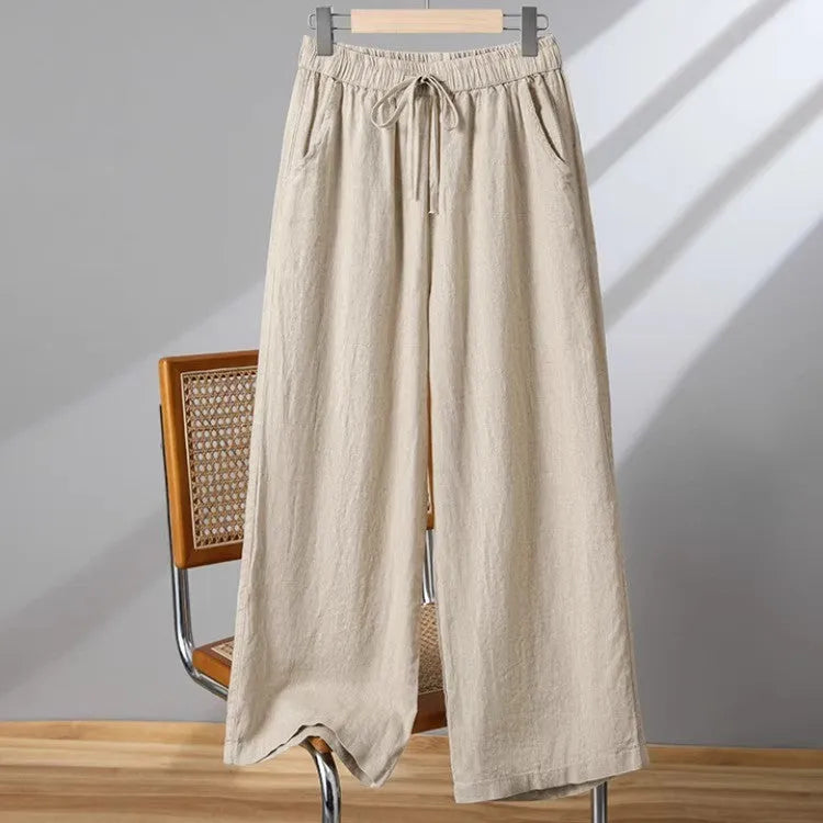Women's straight-leg casual trousers with elastic waistband and lace-up detail in apricot colour