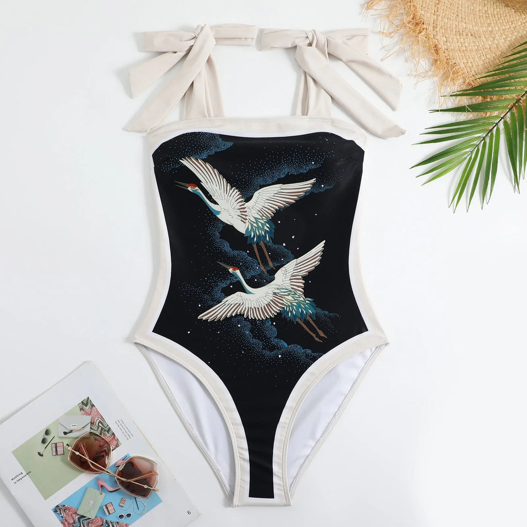 Women's retro one-piece swimsuit with chiffon skirt in floral pattern, showing high-elasticity fit for swimming