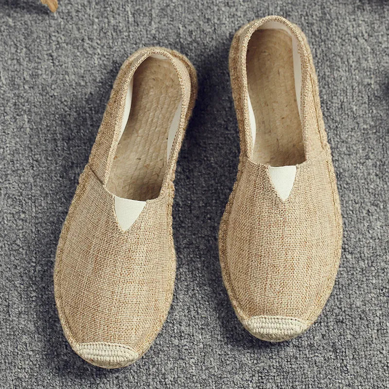 Men's solid-colour canvas casual shoes with round toe in various colours on a plain background.