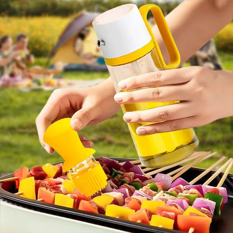 Yellow, green, and brown 550ml glass oil dispenser with silicone brush and stainless steel nozzle.