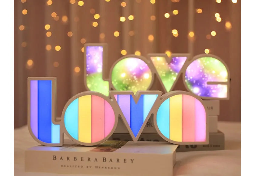 Valentine's Day LED LOVE light with rainbow-style plastic shade, measuring 35.5cm, for romantic room decor