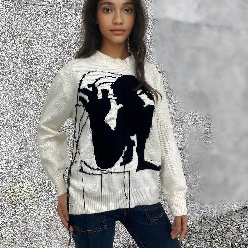 Grey women's alpaca wool pullover sweater with abstract pattern and tassel detail, loose street fashion fit.