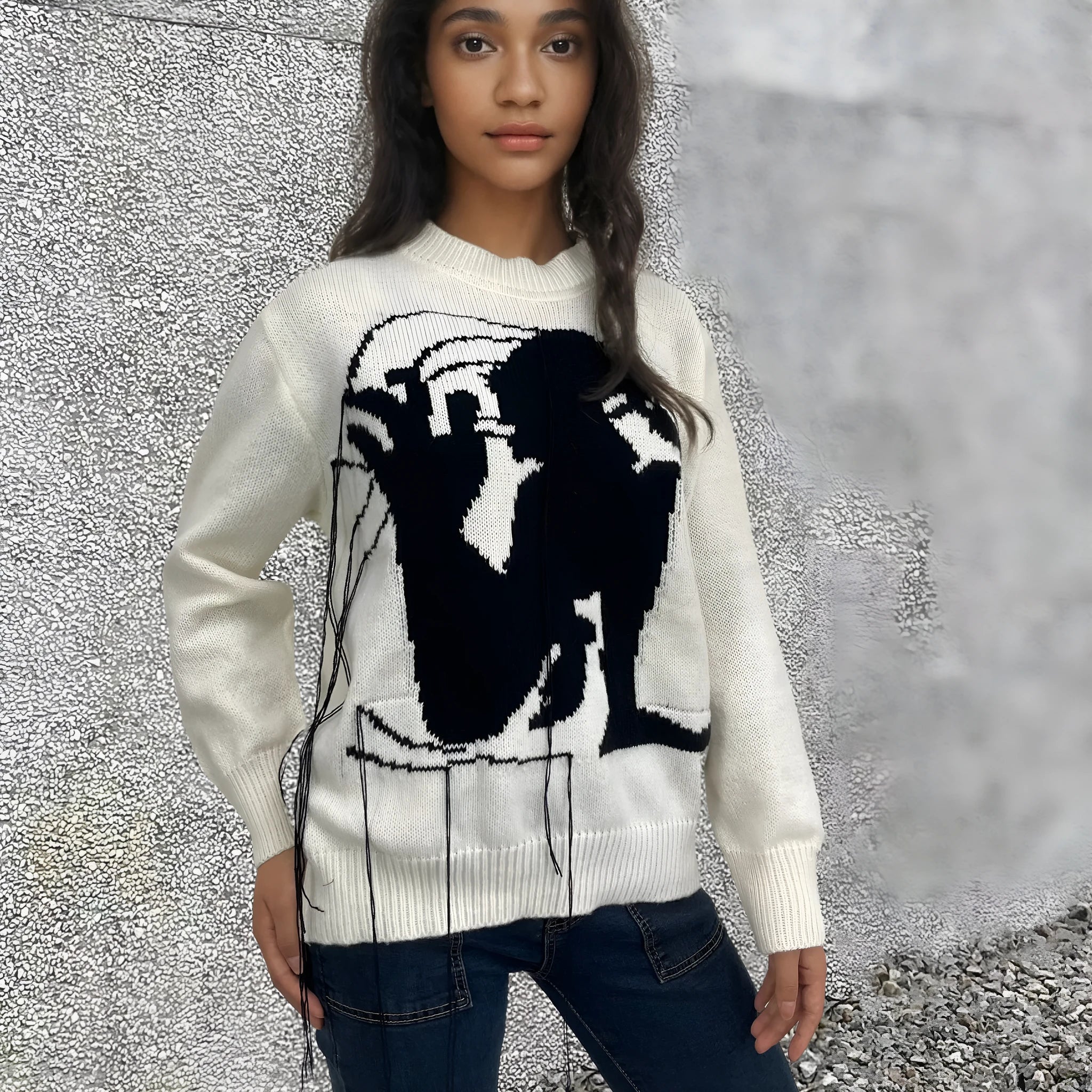 Grey women's alpaca wool pullover sweater with abstract pattern and tassel detail, loose street fashion fit.