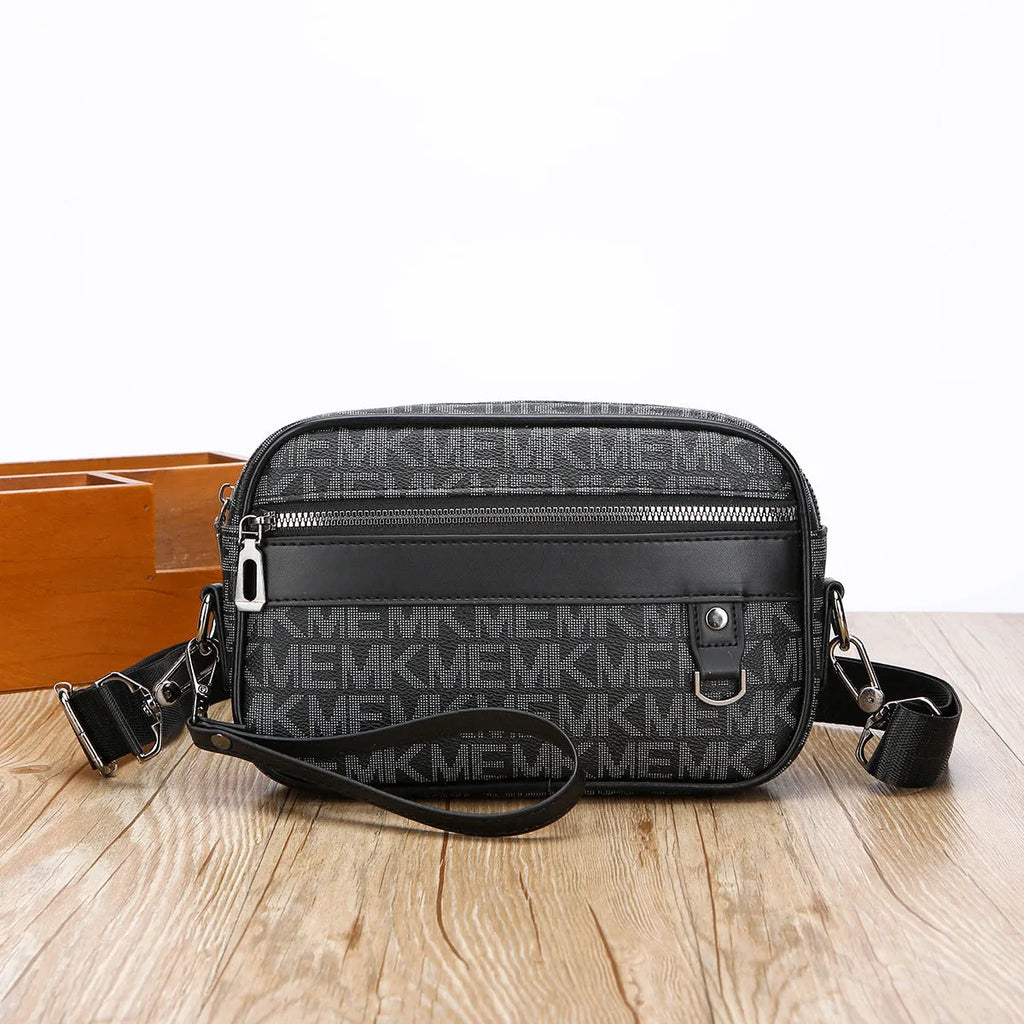 Men's black casual shoulder messenger bag with geometric pattern and handheld strap.