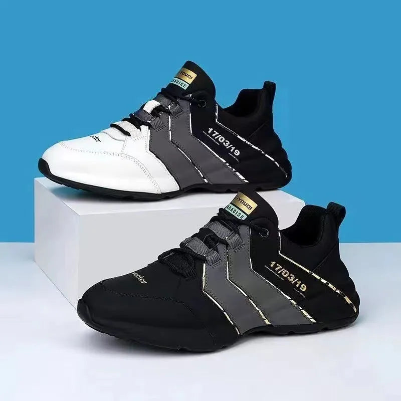 Casual low-top sneakers with round toe, front lace-up, and thick injection-moulded soles in black and grey colour option