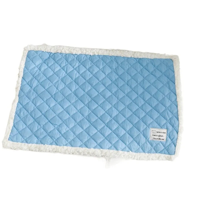 Blue warm terry cloth pet blanket for cats, shown flat with size options M, L, and XL.